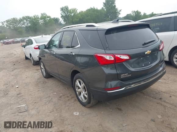 2018 Chevrolet Equinox Premier with VIN 2GNAXVEV8J6189157, listed as a IAAI auction lot 42953230 with 120,260 mi miles and . Bid and sale history available at DreamBid. Image 3.