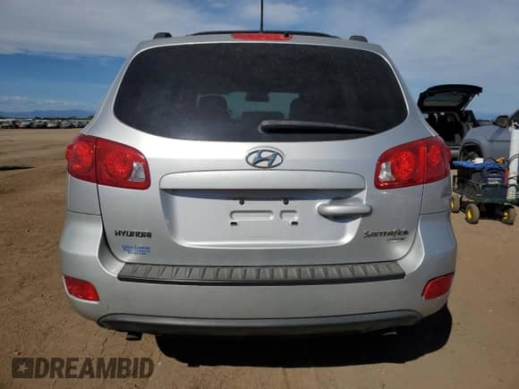 2009 Hyundai Santa Fe GLS z VIN 5NMSG73D19H230882, wystawiony jako Copart lot #71614155 z przebiegiem 118 381 mil mil oraz Szkoda całkowita • Salvage title. Historia ofert i sprzedaży dostępna na DreamBid. Obrazek 6.
