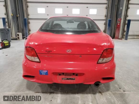 2001 Hyundai Tiburon с VIN KMHJG25F01U226912, выставлен на аукционе Copart как лот 89357135 с пробегом 131 487 миль миль и Чистый • Clean title. История ставок и продаж доступна на DreamBid. Изображение 6.