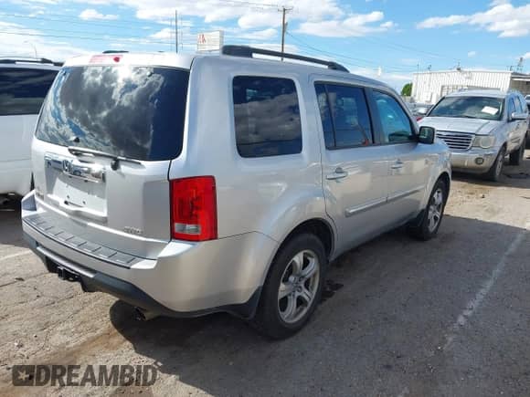 2013 Honda Pilot EX-L with VIN 5FNYF4H5XDB012480, listed as a IAAI auction lot 43124138 with 187,877 mi miles and . Bid and sale history available at DreamBid. Image 4.