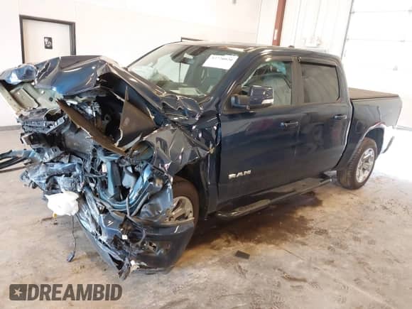 2021 Ram 1500 Big Horn with VIN 1C6SRFFTXMN785937, listed as a IAAI auction lot 42720020 with Not provided miles and . Bid and sale history available at DreamBid. Image 2.