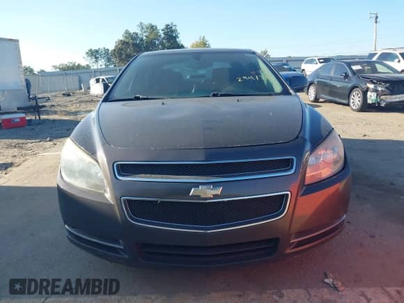 2012 Chevrolet Malibu 1LT z VIN 1G1ZC5E01CF294135, wystawiony jako IAAI lot #43360387 z przebiegiem 188 283 mil mil oraz . Historia ofert i sprzedaży dostępna na DreamBid. Obrazek 12.