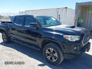 2018 Toyota Tacoma SR5 z VIN 3TMBZ5DN1JM014540, wystawiony jako IAAI lot #42505324 z przebiegiem 112 990 mil mil oraz . Historia ofert i sprzedaży dostępna na DreamBid. Obrazek 1.