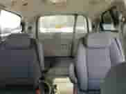 2009 Dodge Grand Caravan SXT z VIN 2D8HN54179R584664, wystawiony jako Copart lot #82564285 z przebiegiem Nie podano mil oraz Szkoda całkowita • Salvage title. Historia ofert i sprzedaży dostępna na DreamBid. Obrazek 10.