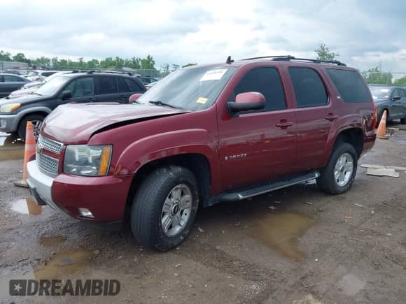 2009 Chevrolet Tahoe 2LT with VIN 1GNFK23079R173252, listed as a IAAI auction lot 42458751 with 235,472 mi miles and . Bid and sale history available at DreamBid. Image 2.