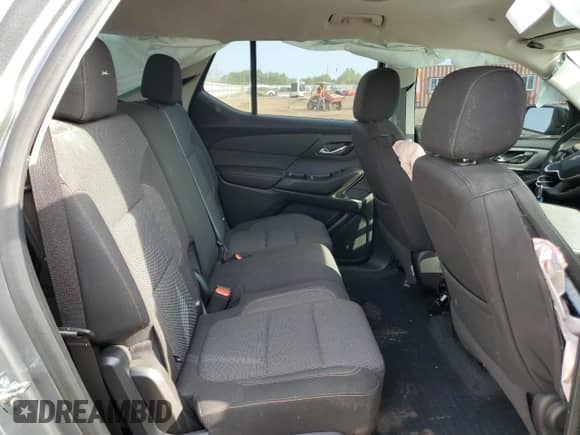 2020 Chevrolet Traverse LS z VIN 1GNERFKW7LJ299783, wystawiony jako Copart lot #80207195 z przebiegiem Nie podano mil oraz Szkoda całkowita • Salvage title. Historia ofert i sprzedaży dostępna na DreamBid. Obrazek 11.