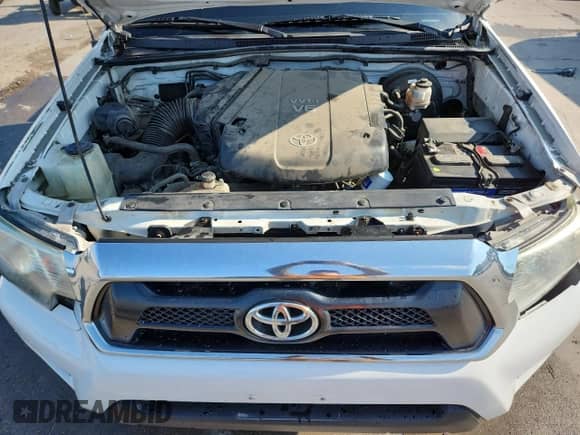 2013 Toyota Tacoma с VIN 5TFUU4EN8DX068304, выставлен на аукционе Copart как лот 71303755 с пробегом 148 320 миль миль и Списание • Salvage title. История ставок и продаж доступна на DreamBid. Изображение 11.