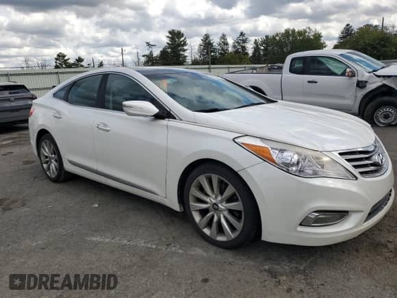 2014 Hyundai Azera Limited с VIN KMHFH4JG0EA357388, выставлен на аукционе Copart как лот 82293895 с пробегом 163 665 миль миль и Списание • Salvage title. История ставок и продаж доступна на DreamBid. Изображение 4.