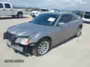 2013 Chrysler 300 with VIN 2C3CCAAG9DH727908, listed as a IAAI auction lot 42702399 with 105,987 mi miles and . Bid and sale history available at DreamBid. Image 2.