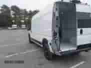 2023 Ram ProMaster Cargo with VIN 3C6LRVDG2PE519339, listed as a IAAI auction lot 43585881 with 25,077 mi miles and . Bid and sale history available at DreamBid. Image 3.