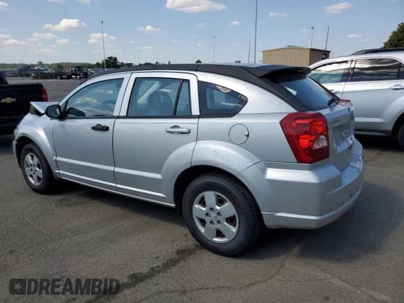 2007 Dodge Caliber z VIN 1B3HB28B87D324624, wystawiony jako Copart lot #72004565 z przebiegiem 129 011 mil mil oraz Szkoda całkowita • Salvage title. Historia ofert i sprzedaży dostępna na DreamBid. Obrazek 2.