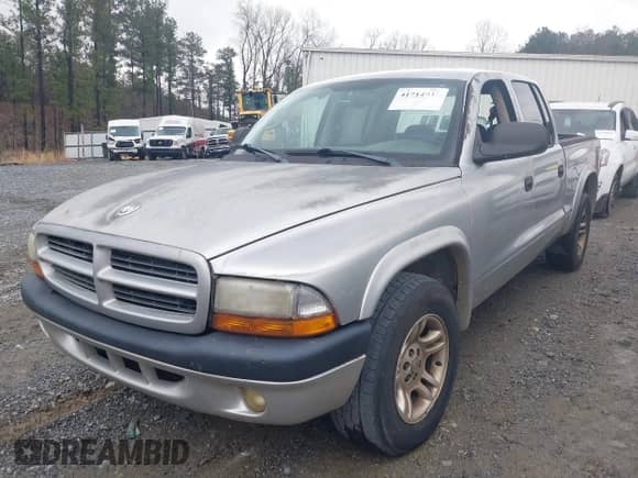 2003 Dodge Dakota с VIN 1D7HL38Z83S184469, выставлен на аукционе IAAI как лот 41714931 с пробегом 194 373 миль миль и . История ставок и продаж доступна на DreamBid. Изображение 2.