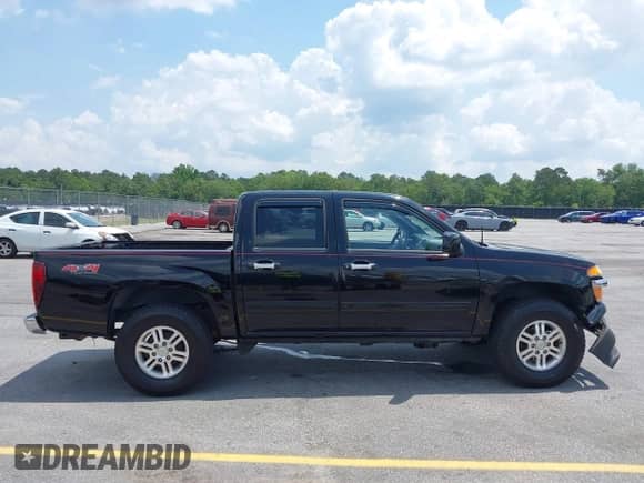 2011 Chevrolet Colorado 1LT z VIN 1GCHTCFE8B8105355, wystawiony jako IAAI lot #42298157 z przebiegiem 213 853 mil mil oraz . Historia ofert i sprzedaży dostępna na DreamBid. Obrazek 13.