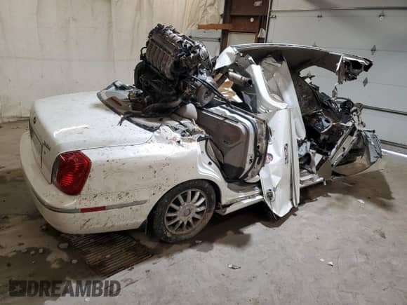 2005 Hyundai XG с VIN KMHFU45E95A382858, выставлен на аукционе Copart как лот 55638665 с пробегом Не указан миль и Списание • Salvage title. История ставок и продаж доступна на DreamBid. Изображение 3.