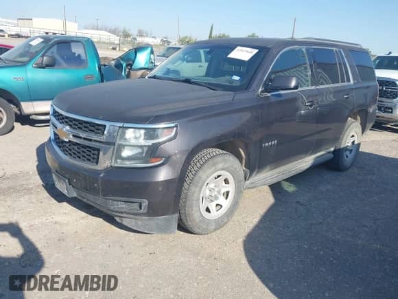 2016 Chevrolet Tahoe LS with VIN 1GNSKAKC9GR414679, listed as a IAAI auction lot 42912848 with 148,823 mi miles and . Bid and sale history available at DreamBid. Image 2.