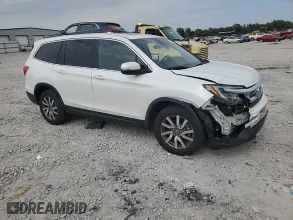 2020 Honda Pilot EX-L z VIN 5FNYF6H50LB060421, wystawiony jako Copart lot #80111525 z przebiegiem 58 305 mil mil oraz Szkoda całkowita • Salvage title. Historia ofert i sprzedaży dostępna na DreamBid. Obrazek 4.