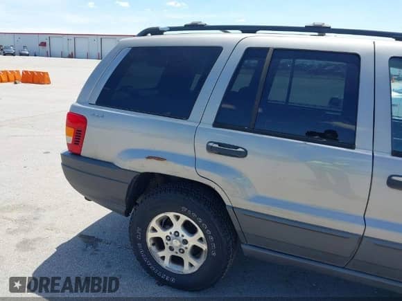 2001 Jeep Grand Cherokee Laredo с VIN 1J4GW48SX1C728557, выставлен на аукционе IAAI как лот 43319993 с пробегом 165 678 миль миль и . История ставок и продаж доступна на DreamBid. Изображение 12.