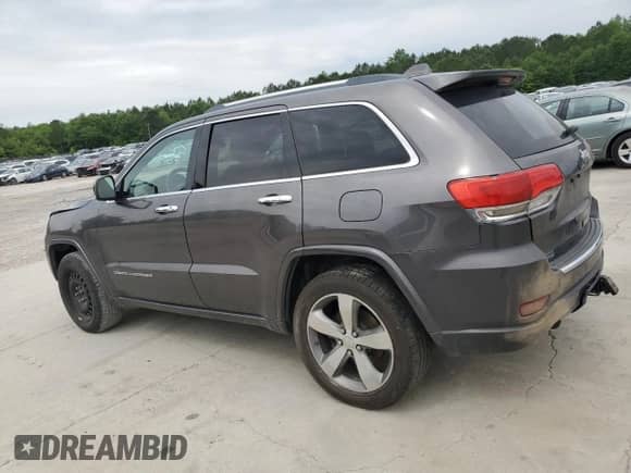 2015 Jeep Grand Cherokee Overland с VIN 1C4RJECT7FC629477, выставлен на аукционе Copart как лот 55810215 с пробегом 154 990 миль миль и Списание • Salvage title. История ставок и продаж доступна на DreamBid. Изображение 2.