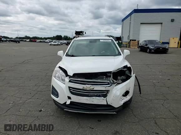 2016 Chevrolet Trax LT z VIN KL7CJPSB0GB573087, wystawiony jako Copart lot #71499595 z przebiegiem 99 709 mil mil oraz Szkoda całkowita • Salvage title. Historia ofert i sprzedaży dostępna na DreamBid. Obrazek 14.