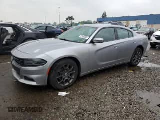 2018 Dodge Charger GT с VIN 2C3CDXJG1JH189569, выставлен на аукционе Copart как лот 67126065 с пробегом 153 315 миль миль и Чистый • Clean title. История ставок и продаж доступна на DreamBid. Изображение 1.