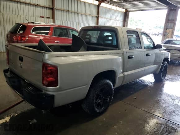 2006 Dodge Dakota ST with VIN 1D7HW28K36S507044, listed as a Copart auction lot 61255725 with 117,459 mi miles and Salvage title. Bid and sale history available at DreamBid. Image 3.