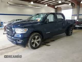 2023 Ram 1500 Laramie with VIN 1C6SRFJT7PN541075, listed as a Copart auction lot 69354215 with 51,372 mi miles and Salvage title. Bid and sale history available at DreamBid. Image 1.