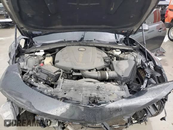 2018 Chevrolet Camaro 1LT с VIN 1G1FB1RSXJ0122146, выставлен на аукционе Copart как лот 69740555 с пробегом Не указан миль и На запчасти • Non repairable. История ставок и продаж доступна на DreamBid. Изображение 11.