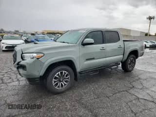 2022 Toyota Tacoma SR5 with VIN 3TMAZ5CN5NM174388, listed as a Copart auction lot 81242475 with 83,835 mi miles and Salvage title. Bid and sale history available at DreamBid. Image 1.