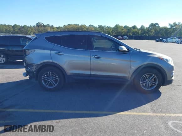 2018 Hyundai Santa Fe 2.4L с VIN 5XYZUDLB5JG514034, выставлен на аукционе IAAI как лот 43373916 с пробегом 114 434 миль миль и . История ставок и продаж доступна на DreamBid. Изображение 13.