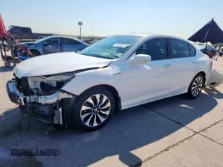2015 Honda Accord Touring with VIN 1HGCR6F70FA012499, listed as a Copart auction lot 84239215 with 217,323 mi miles and Salvage title. Bid and sale history available at DreamBid. Image 1.