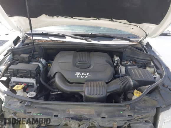 2013 Jeep Grand Cherokee Limited z VIN 1C4RJFBG8DC556272, wystawiony jako IAAI lot #43352592 z przebiegiem 118 793 mil mil oraz . Historia ofert i sprzedaży dostępna na DreamBid. Obrazek 10.