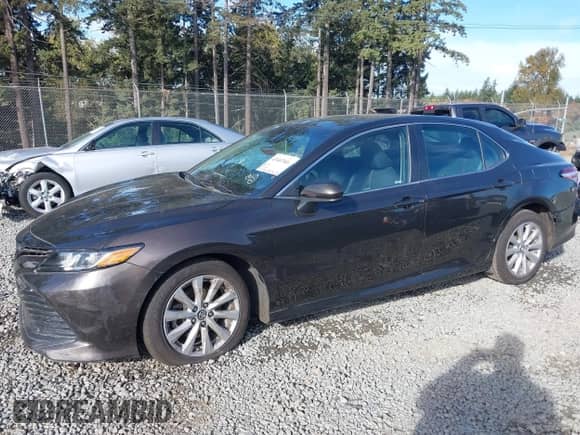 2019 Toyota Camry SE z VIN 4T1B11HK3KU188960, wystawiony jako IAAI lot #43407403 z przebiegiem 97 496 mil mil oraz . Historia ofert i sprzedaży dostępna na DreamBid. Obrazek 6.