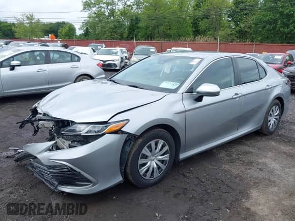 2022 Toyota Camry Hybrid LE with VIN 4T1C31AK4NU588863, listed as a IAAI auction lot 42375893 with 218,285 mi miles and . Bid and sale history available at DreamBid. Image 18.