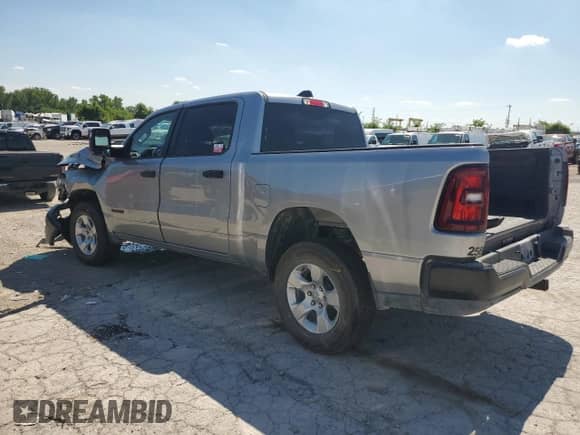 2025 Ram 1500 Tradesman with VIN 1C6RRFGGXSN674348, listed as a Copart auction lot 62982755 with 10,596 mi miles and Salvage title. Bid and sale history available at DreamBid. Image 2.