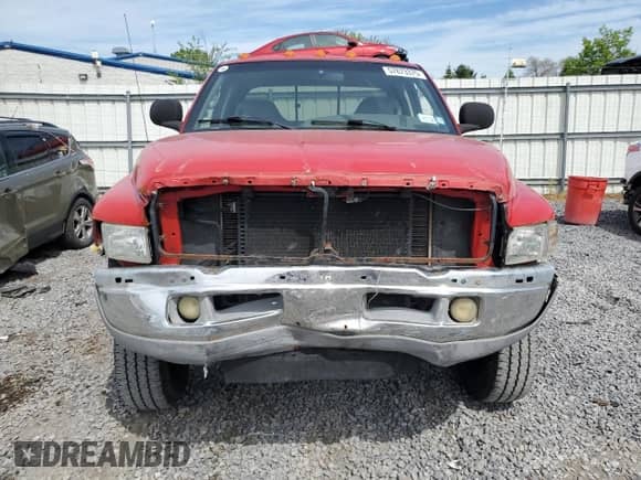 2000 Dodge 2500 with VIN 1B7KF23Z6YJ187490, listed as a Copart auction lot 57873375 with 238,769 mi miles and Salvage title. Bid and sale history available at DreamBid. Image 5.