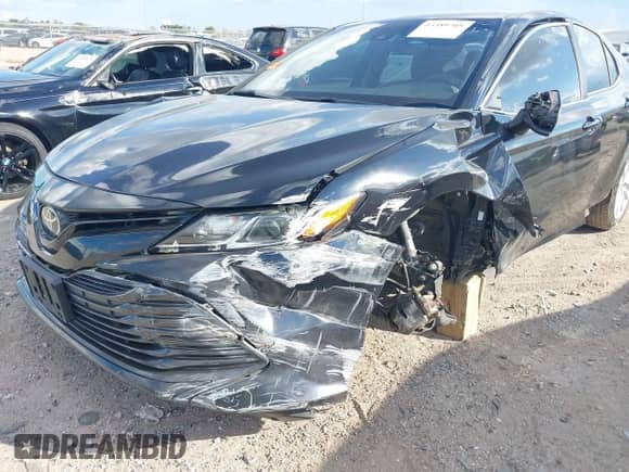 2019 Toyota Camry SE z VIN 4T1B11HK4KU167017, wystawiony jako IAAI lot #43389705 z przebiegiem 106 141 mil mil oraz . Historia ofert i sprzedaży dostępna na DreamBid. Obrazek 6.