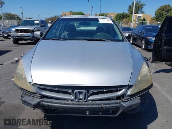 2006 Honda Accord LX с VIN JHMCM56466C010594, выставлен на аукционе IAAI как лот 43077244 с пробегом 156 226 миль миль и . История ставок и продаж доступна на DreamBid. Изображение 12.