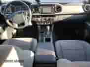 2018 Toyota Tacoma SR5 with VIN 3TMAZ5CNXJM073034, listed as a Copart auction lot 80509895 with 121,163 mi miles and Salvage title. Bid and sale history available at DreamBid. Image 8.