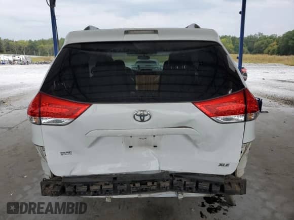 2012 Toyota Sienna XLE with VIN 5TDYK3DC8CS205280, listed as a Copart auction lot 81258065 with 185,820 mi miles and Salvage title. Bid and sale history available at DreamBid. Image 6.