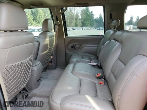 1999 Chevrolet Suburban z VIN 1GNGK26J9XJ518169, wystawiony jako Copart lot #89381325 z przebiegiem 53 435 mil mil oraz Szkoda całkowita • Salvage title. Historia ofert i sprzedaży dostępna na DreamBid. Obrazek 11.