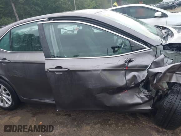 2023 Toyota Camry LE z VIN 4T1C11AK3PU141255, wystawiony jako IAAI lot #42938395 z przebiegiem 59 258 mil mil oraz . Historia ofert i sprzedaży dostępna na DreamBid. Obrazek 14.