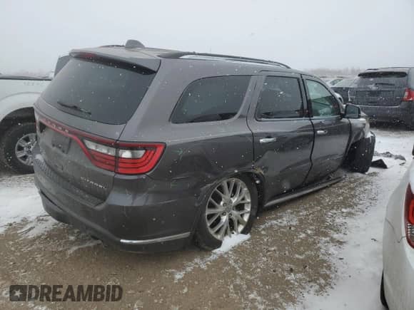 2014 Dodge Durango Citadel z VIN 1C4SDJET8EC591724, wystawiony jako Copart lot #88804615 z przebiegiem 111 700 mil mil oraz Szkoda całkowita • Salvage title. Historia ofert i sprzedaży dostępna na DreamBid. Obrazek 3.