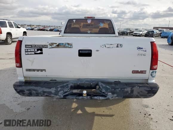 1998 GMC Sierra 1500 z VIN 1GTEC14W8WZ534837, wystawiony jako Copart lot #50653165 z przebiegiem 218 103 mil mil oraz Szkoda całkowita • Salvage title. Historia ofert i sprzedaży dostępna na DreamBid. Obrazek 6.