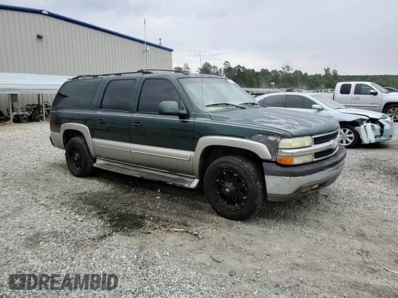 2003 Chevrolet Suburban LT с VIN 1GNEC16Z33J228394, выставлен на аукционе Copart как лот 80285015 с пробегом 394 371 миль миль и Списание • Salvage title. История ставок и продаж доступна на DreamBid. Изображение 14.