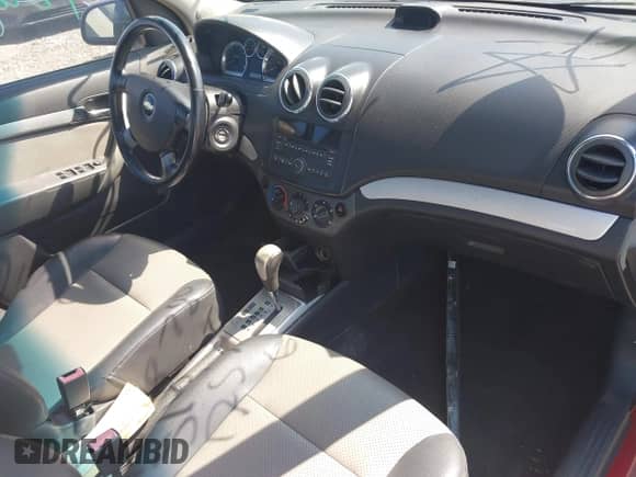 2011 Chevrolet Aveo 2LT z VIN KL1TG5DE7BB231276, wystawiony jako IAAI lot #43155206 z przebiegiem Nie podano mil oraz . Historia ofert i sprzedaży dostępna na DreamBid. Obrazek 5.