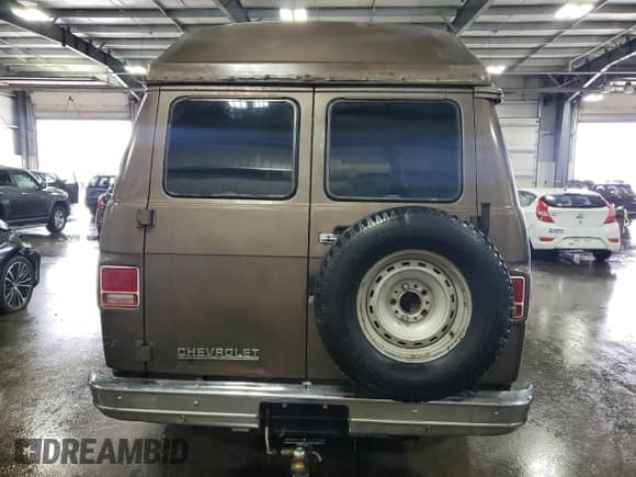 1984 Chevrolet Chevy Van с VIN 1GCEG25H9E7160968, выставлен на аукционе Copart как лот 69109245 с пробегом 73 659 миль миль и Списание • Salvage title. История ставок и продаж доступна на DreamBid. Изображение 6.