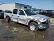 2002 Dodge Dakota Sport z VIN 1B7HL38N32S503296, wystawiony jako Copart lot #75428444 z przebiegiem 239 482 mil mil oraz Szkoda całkowita • Salvage title. Historia ofert i sprzedaży dostępna na DreamBid. Obrazek 4.