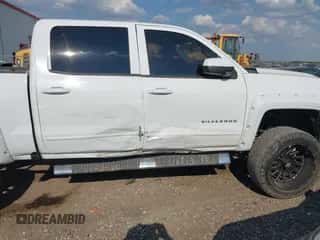 2017 Chevrolet Silverado 1500 LT z VIN 3GCPCREC5HG170813, wystawiony jako IAAI lot #43228209 z przebiegiem 168 071 mil mil oraz . Historia ofert i sprzedaży dostępna na DreamBid. Obrazek 6.