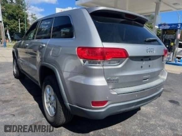 2017 Jeep Grand Cherokee Laredo с VIN 1C4RJFAG5HC771809, выставлен на аукционе Copart как лот 71249125 с пробегом 169 000 миль миль и Чистый • Clean title. История ставок и продаж доступна на DreamBid. Изображение 3.