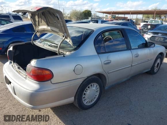 2004 Chevrolet Malibu Classic with VIN 1G1ND52F34M589464, listed as a IAAI auction lot 41566346 with 128,084 mi miles and . Bid and sale history available at DreamBid. Image 4.